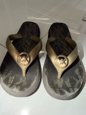 Michael Kors Black and Gold MK Logo Thong Sandals